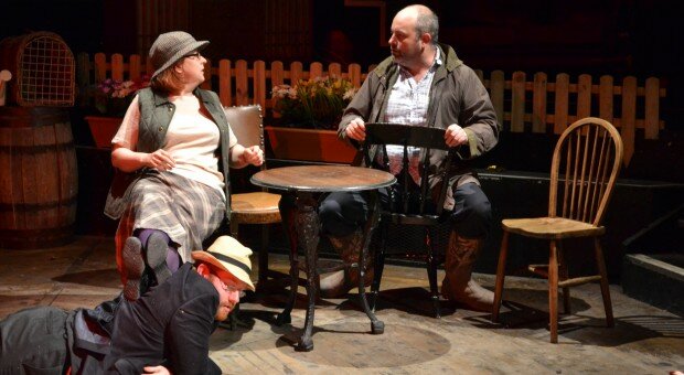 Angie Waller as Diana Bowman and her prodigal husband Archie (Ian Hayles). Trev Fleming as convenient footstool.